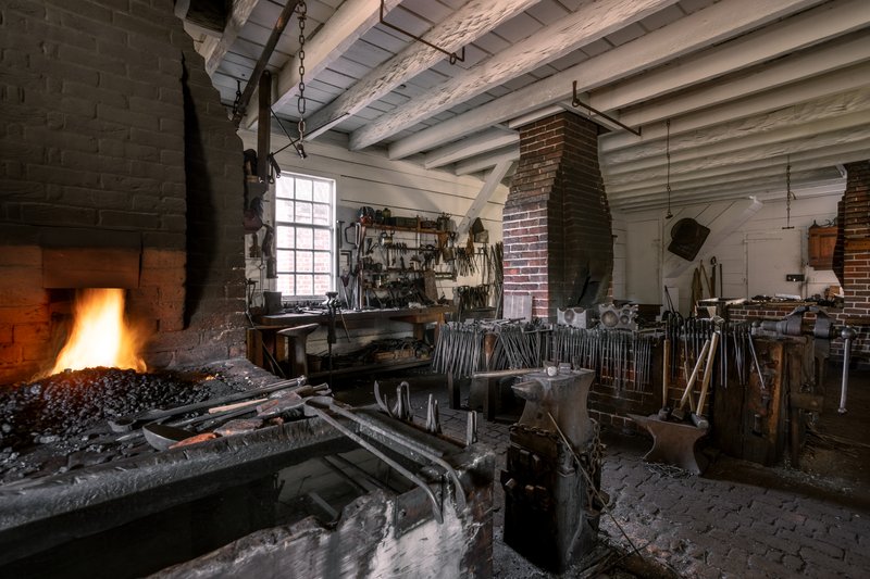 An interior image of the blacksmiths&#x27; shop