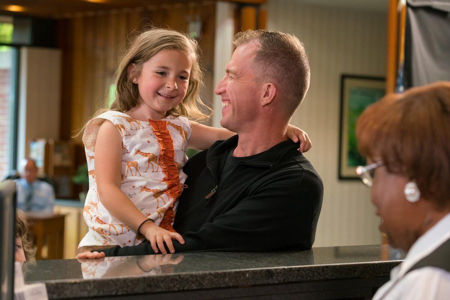 Father & Daughter Checking into the Woodlands Hotel