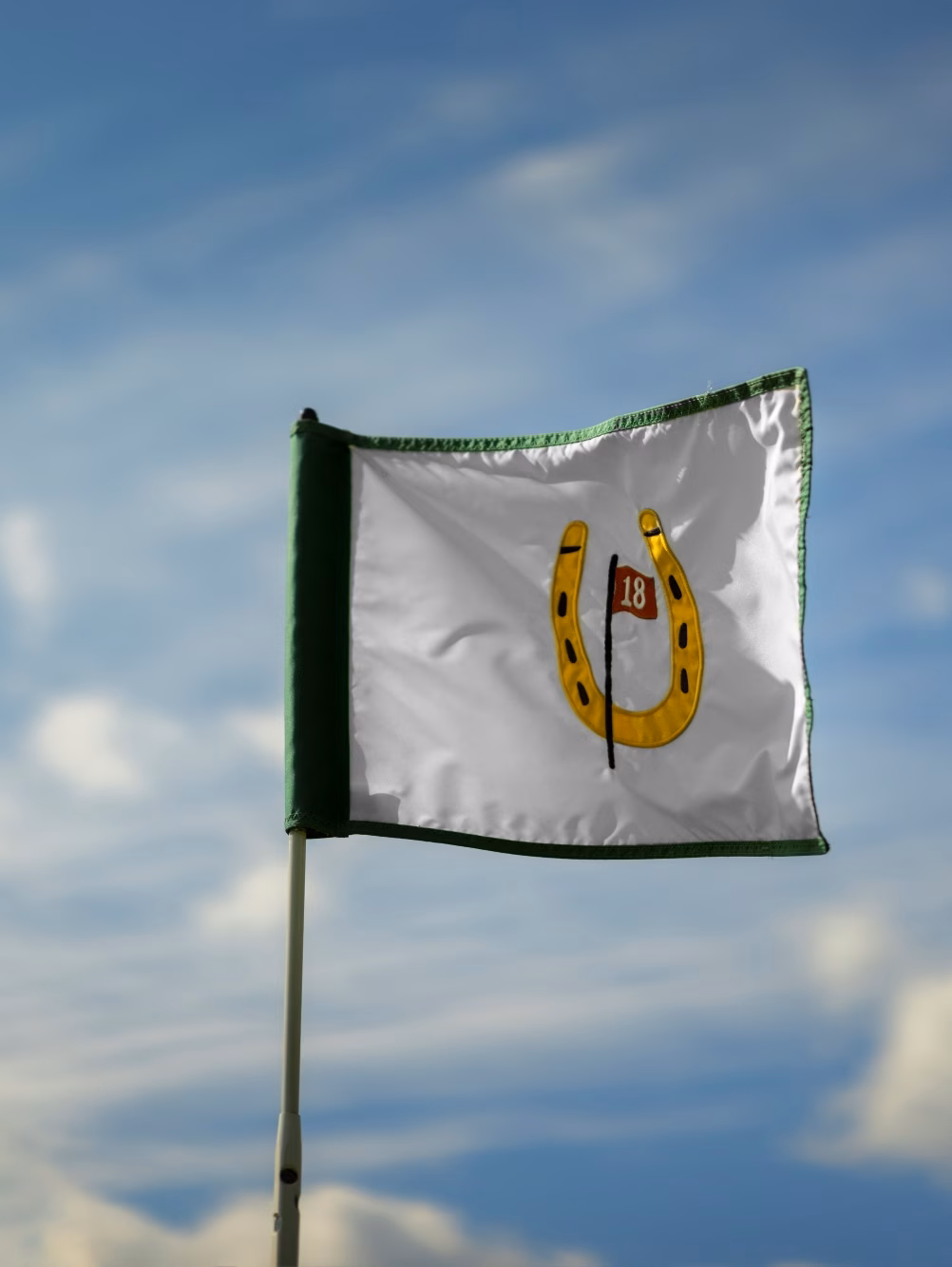 Gold Course Flag in the Wind
