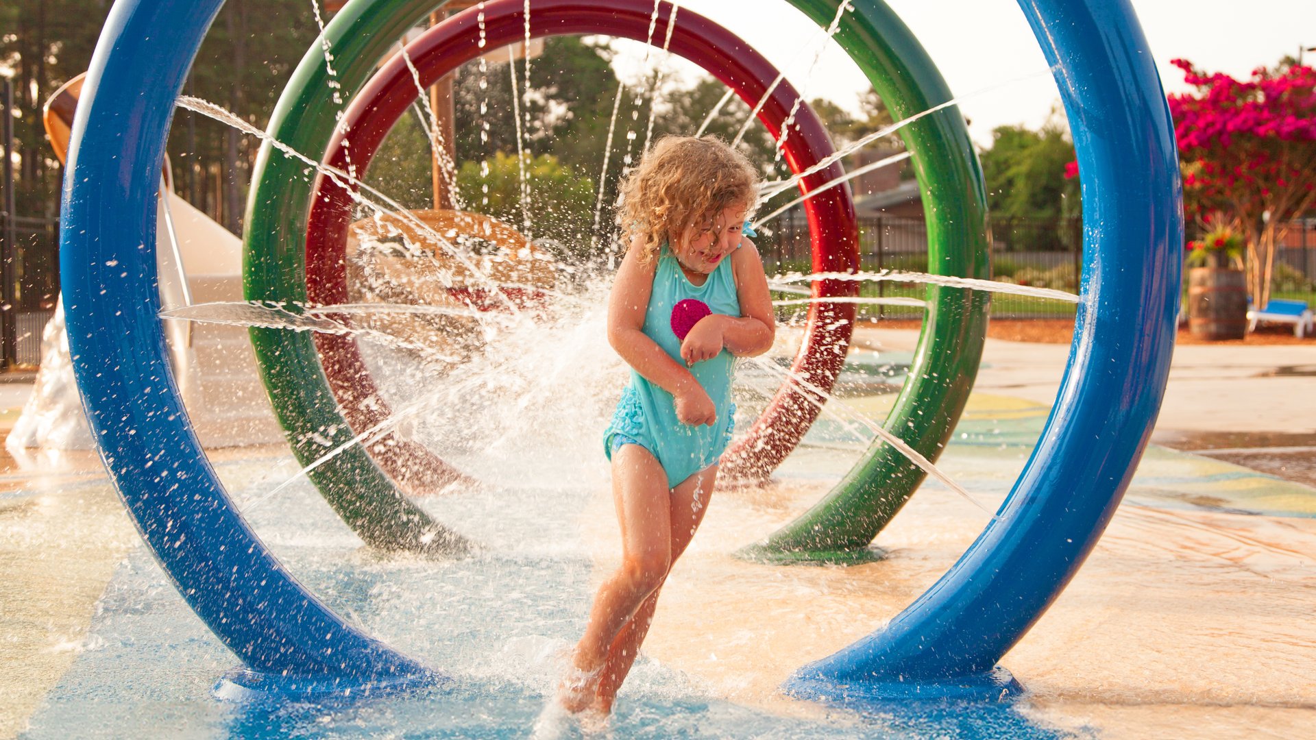 girl at splash park tall