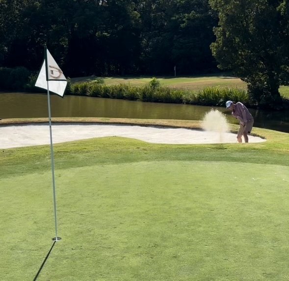 golfer in bunker
