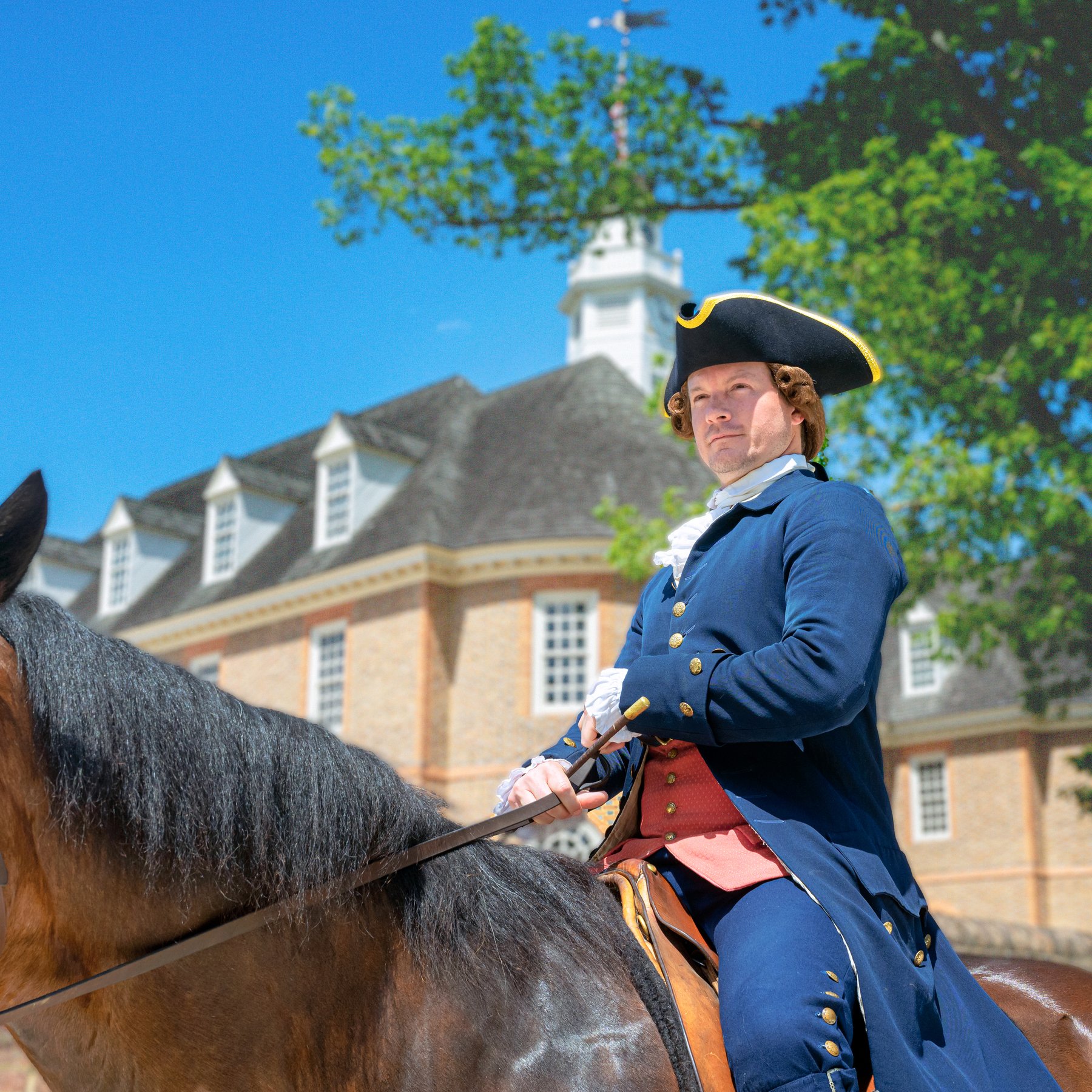 Nation Builder Thomas Jefferson sits atop a horse in front of the Capitol building.