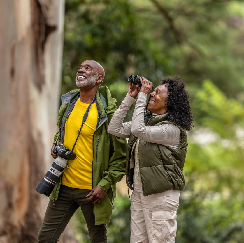 Couple Bird Watching While Hiking