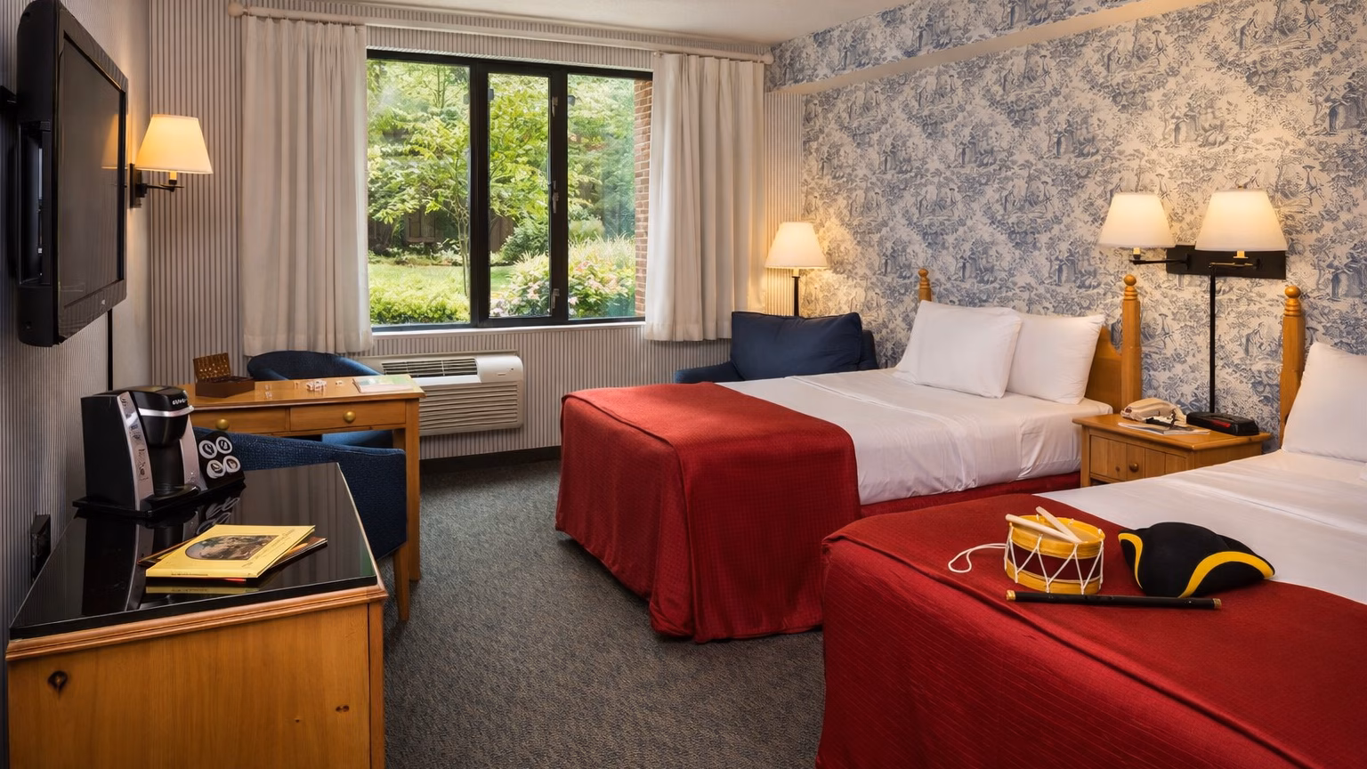 woodlands room with toy drum and two beds